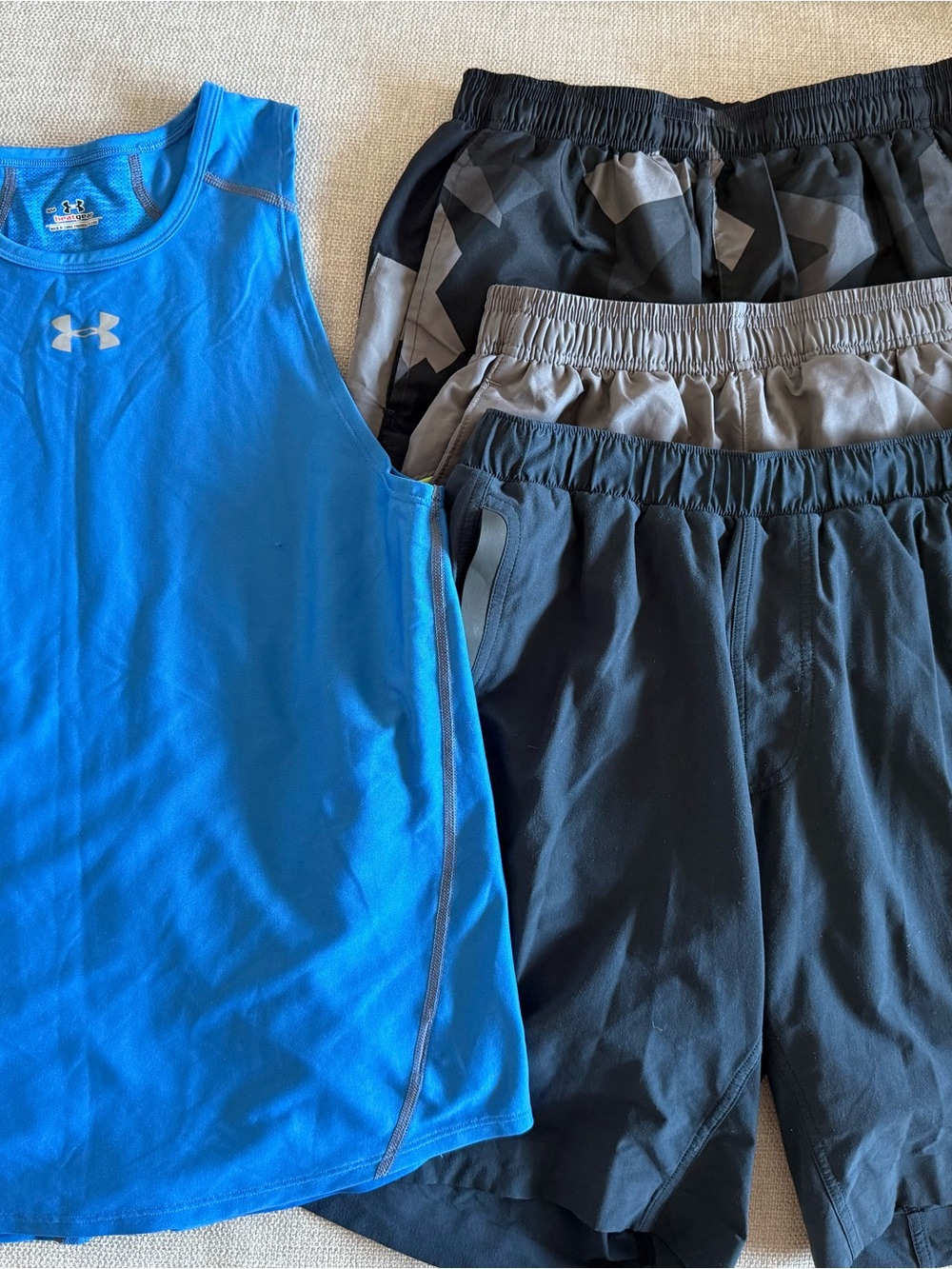 Workout Bundle! 1 Lululemon short (sm) 2 UA shorts (sm) 1 UA tank (sm)